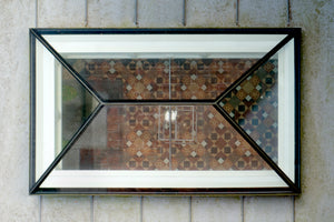 roof lantern seen from above, showing a tiled floor underneath 