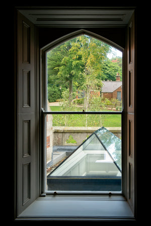 a lantern rooflight seen through a doorway