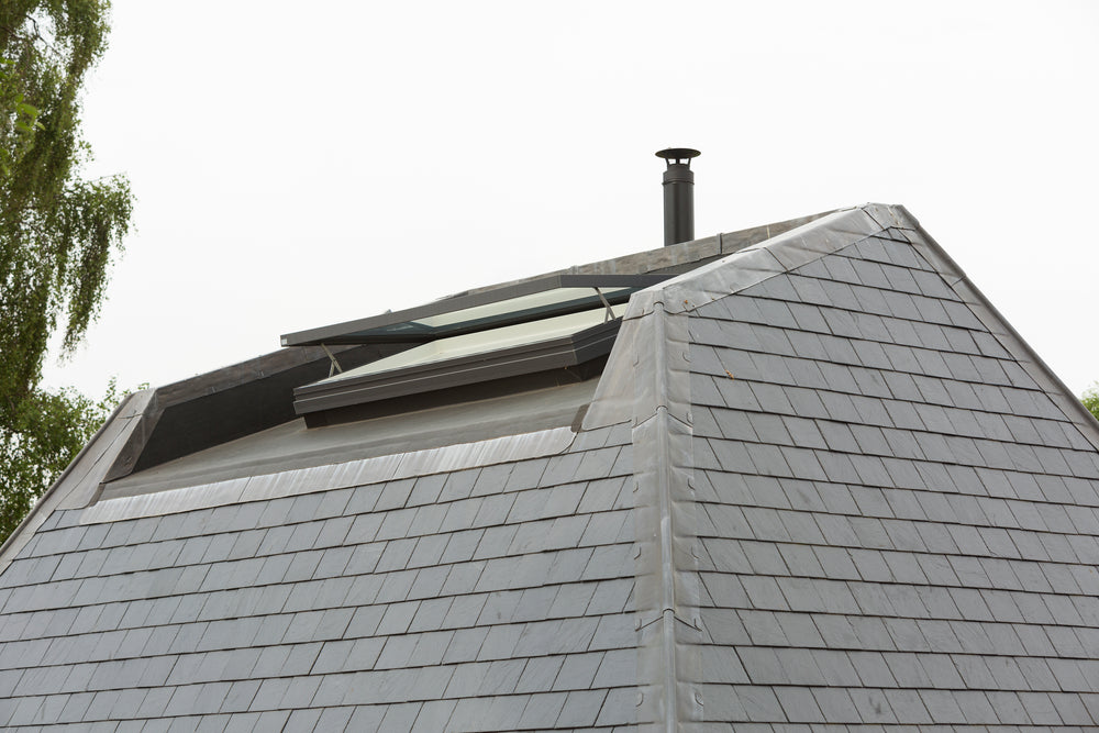 open rooflight on a tall tiled roof