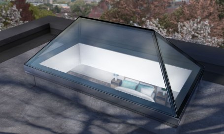 An elongated pyramid rooflight (sometimes called a lantern rooflight) on top of a house.